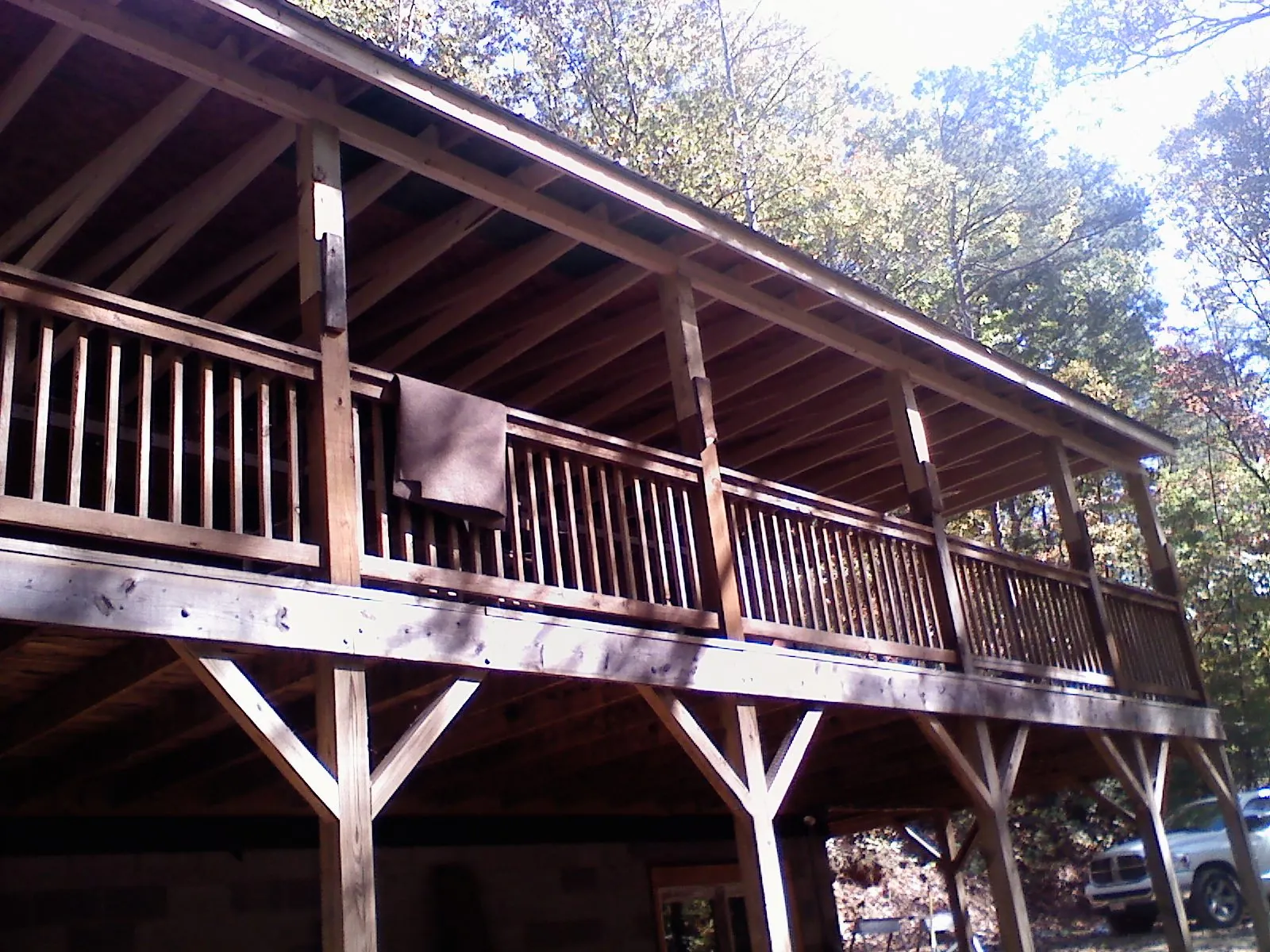 Timber framing under a new elevated porch and deck — Roof Leak Repair in West Hollywood by Roofing Brothers